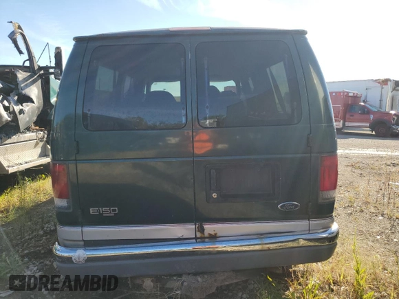 2000 Ford Econoline Passenger XL with VIN 1FMRE11L9YHB19715, listed as a Copart auction lot 69192734 with 237,129 mi miles and Salvage title. Bid and sale history available at DreamBid. Image 6.