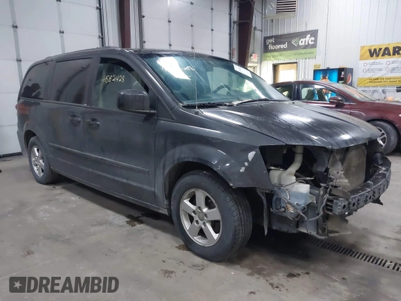 2012 Dodge Grand Caravan SXT with VIN 2C4RDGCG7CR358266, listed as a IAAI auction lot 41582428 with 169,137 mi miles and . Bid and sale history available at DreamBid. Image 1.