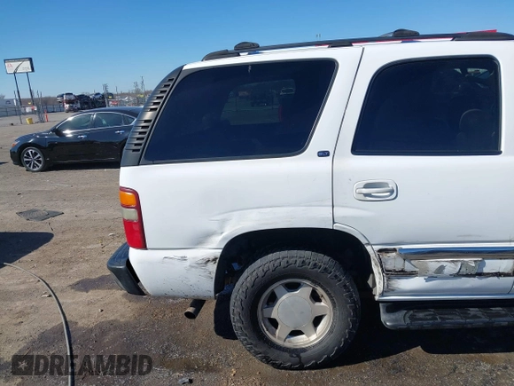 2003 GMC Yukon SLT with VIN 1GKEC13Z13J197955, listed as a IAAI auction lot 41586841 with 208,752 mi miles. Bid and sale history available at carsss.com. Image 18.