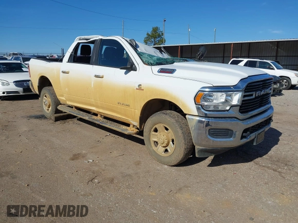 2019 Ram 2500 Lone Star with VIN 3C6UR5DL1KG663656, listed as a IAAI auction lot 41329641 with 124,361 mi miles and . Bid and sale history available at DreamBid. Image 1.