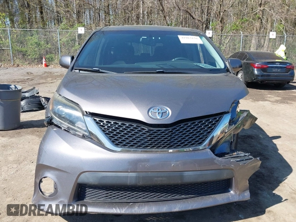 2015 Toyota Sienna SE with VIN 5TDXK3DC3FS682327, listed as a IAAI auction lot 41983156 with 141,640 mi miles. Bid and sale history available at carsss.com. Image 12.
