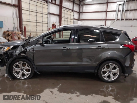 2019 Ford Escape Titanium with VIN 1FMCU9J91KUB11957, listed as a IAAI auction lot 41928264 with 72,460 mi miles. Bid and sale history available at carsss.com. Image 15.