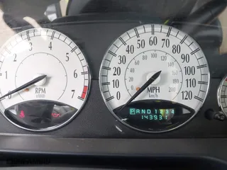 2002 Chrysler Sebring Limited with VIN 1C3EL65R72N201668, listed as a IAAI auction lot 41018612 with 143,931 mi miles. Bid and sale history available at carsss.com. Image 7.