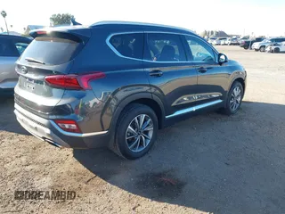 2020 Hyundai Santa Fe SEL w/SULEV with VIN 5NMS33AD7LH184750, listed as a IAAI auction lot 41637769 with 89,166 mi miles. Bid and sale history available at carsss.com. Image 4.