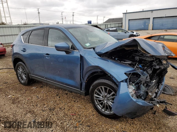 2017 Mazda CX-5 Touring z VIN JM3KFBCL2H0129000, wystawiony jako Copart lot #52107005 z przebiegiem 55 411 mil mil oraz Szkody całkowita. Historia ofert i sprzedaży dostępna na DreamBid. Obrazek 4.