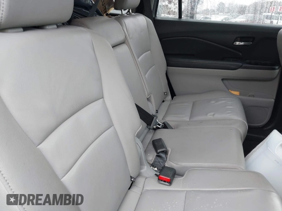 2017 Honda Pilot EX-L with VIN 5FNYF6H51HB069068, listed as a IAAI auction lot 41567728 with 100,618 mi miles and . Bid and sale history available at DreamBid. Image 8.