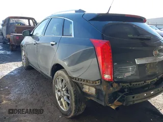 2014 Cadillac SRX Premium Collection z VIN 3GYFNDE34ES581728, wystawiony jako IAAI lot #41578226 z przebiegiem 121 118 mil mil oraz . Historia ofert i sprzedaży dostępna na DreamBid. Obrazek 3.