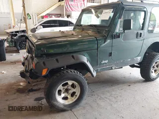 2000 Jeep Wrangler Sport with VIN 1J4FA49S8YP780104, listed as a IAAI auction lot 42095731 with Not provided miles and . Bid and sale history available at DreamBid. Image 6.