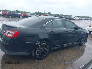2013 Ford Taurus SHO с VIN 1FAHP2KT9DG144215, выставлен на аукционе IAAI как лот 42107386 с пробегом 199 934 миль миль и . История ставок и продаж доступна на DreamBid. Изображение 13.