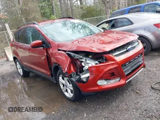 2016 Ford Escape SE with VIN 1FMCU9GXXGUB02932, listed as a IAAI auction lot 41797351 with 74,284 mi miles. Bid and sale history available at carsss.com. Image 1.