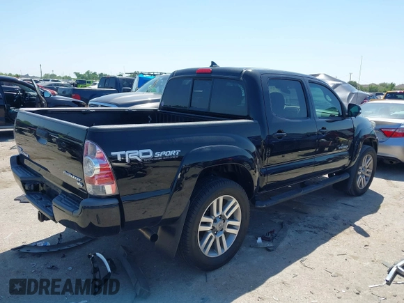 2014 Toyota Tacoma PreRunner with VIN 3TMJU4GN0EM160403, listed as a IAAI auction lot 41979894 with 169,941 mi miles. Bid and sale history available at carsss.com. Image 4.
