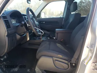 2011 Jeep Liberty Sport 70th Anniversary with VIN 1J4PN2GK8BW533159, listed as a Copart auction lot 46351335 with 148,808 mi miles and Clean Title. Bid and sale history available at DreamBid. Image 7.