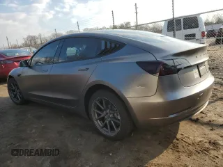 2022 Tesla Model 3 Long Range with VIN 5YJ3E1EBXNF272496, listed as a Copart auction lot 43973435 with 28,450 mi miles and Salvage Title. Bid and sale history available at DreamBid. Image 2.