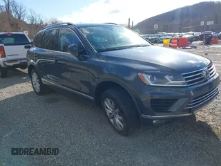 2016 Volkswagen Touareg Sport with VIN WVGEF9BP2GD005315, listed as a IAAI auction lot 41588590 with 134,709 mi miles and . Bid and sale history available at DreamBid. Image 1.