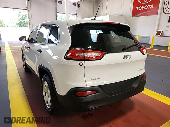 2015 Jeep Cherokee Sport with VIN 1C4PJMAB8FW685146, listed as a IAAI auction lot 42842417 with 130,325 mi miles and . Bid and sale history available at DreamBid. Image 3.