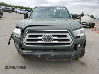 2021 Toyota Tacoma SR z VIN 3TYCZ5AN3MT046066, wystawiony jako Copart lot #54785665 z przebiegiem 57 897 mil mil oraz Szkoda całkowita • Salvage title. Historia ofert i sprzedaży dostępna na DreamBid. Obrazek 5.