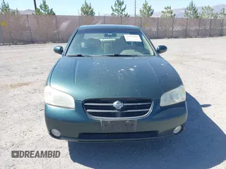 2000 Nissan Maxima GXE z VIN JN1CA31A8YT007617, wystawiony jako IAAI lot #42479039 z przebiegiem 165 950 mil mil oraz . Historia ofert i sprzedaży dostępna na DreamBid. Obrazek 6.
