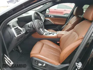 2025 BMW X6 M60i with VIN 5UX43EX02S9W76491, listed as a Copart auction lot 85033264 with 5,173 mi miles and Salvage Title. Bid and sale history available at carsss.com. Image 7.