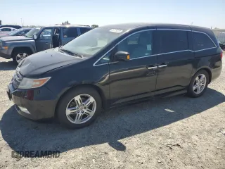 2012 Honda Odyssey Touring with VIN 5FNRL5H95CB004226, listed as a Copart auction lot 55775235 with 157,521 mi miles and Clean Title. Bid and sale history available at DreamBid. Image 1.