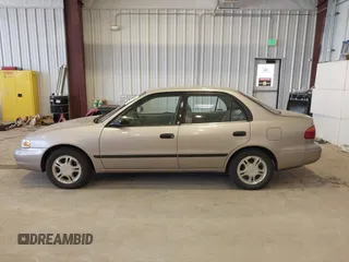 2001 Chevrolet Prizm z VIN 1Y1SK52811Z400984, wystawiony jako IAAI lot #42550019 z przebiegiem 226 246 mil mil oraz . Historia ofert i sprzedaży dostępna na DreamBid. Obrazek 14.