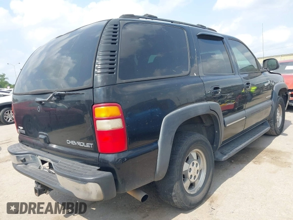 2002 Chevrolet Tahoe LS with VIN 1GNEC13Z72R279613, listed as a IAAI auction lot 42267778 with 300,378 mi miles and . Bid and sale history available at DreamBid. Image 4.