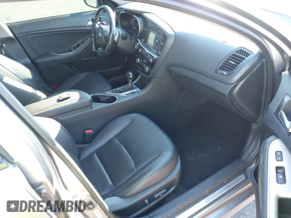 2015 Kia Optima SX Turbo with VIN 5XXGR4A66FG382167, listed as a IAAI auction lot 40951399 with 77,083 mi miles and . Bid and sale history available at DreamBid. Image 5.