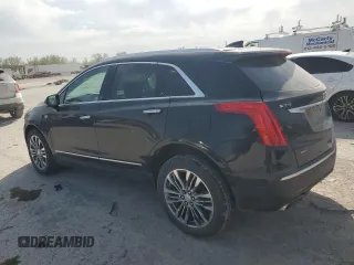 2017 Cadillac XT5 Premium Luxury AWD z VIN 1GYKNERS3HZ185853, wystawiony jako Copart lot #53446175 z przebiegiem 89 669 mil mil oraz Szkody całkowita. Historia ofert i sprzedaży dostępna na DreamBid. Obrazek 2.