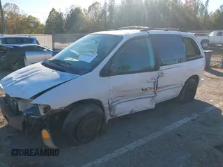 1999 Dodge Caravan SE with VIN 2B4GP45G0XR312100, listed as a IAAI auction lot 40966771 with 233,188 mi miles and . Bid and sale history available at carsss.com. Image 2.