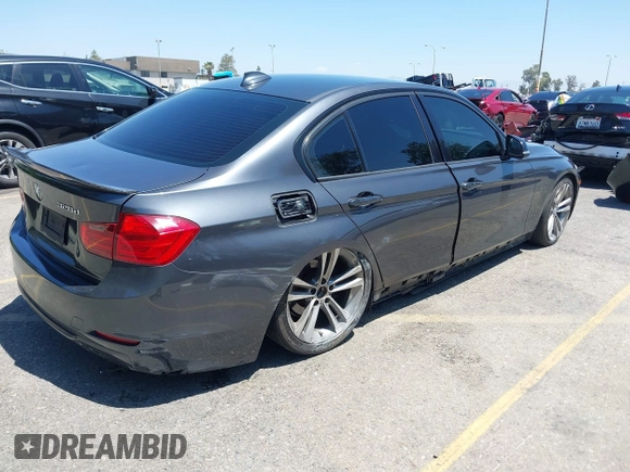 2014 BMW 3 Series 328d with VIN WBA3D3C51EK155031, listed as a IAAI auction lot 42149784 with 204,521 mi miles and . Bid and sale history available at carsss.com. Image 4.