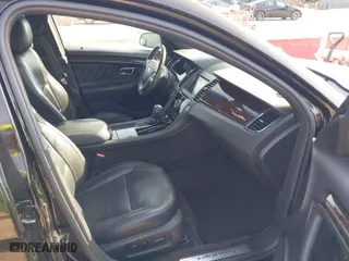 2013 Ford Taurus Limited with VIN 1FAHP2F85DG188511, listed as a IAAI auction lot 42077614 with 165,059 mi miles. Bid and sale history available at carsss.com. Image 5.