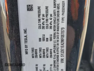 2021 Tesla Model 3 Standard Range Plus with VIN 5YJ3E1EA2MF087879, listed as a Copart auction lot 51853235 with 65,477 mi miles and Non Repairable. Bid and sale history available at carsss.com. Image 14.