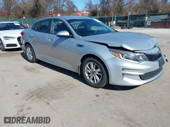 2016 Kia Optima LX with VIN 5XXGT4L37GG084538, listed as a IAAI auction lot 41784807 with 128,928 mi miles. Bid and sale history available at carsss.com. Image 1.