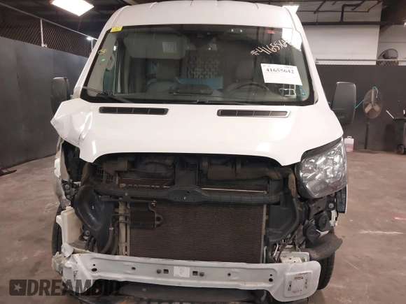 2016 Ford Transit Cargo with VIN 1FTYE1CM0GKA13242, listed as a IAAI auction lot 41655642 with 107,589 mi miles and . Bid and sale history available at carsss.com. Image 6.