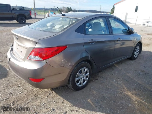 2013 Hyundai Accent GLS with VIN KMHCT4AEXDU464526, listed as a IAAI auction lot 41904354 with 157,368 mi miles. Bid and sale history available at carsss.com. Image 4.