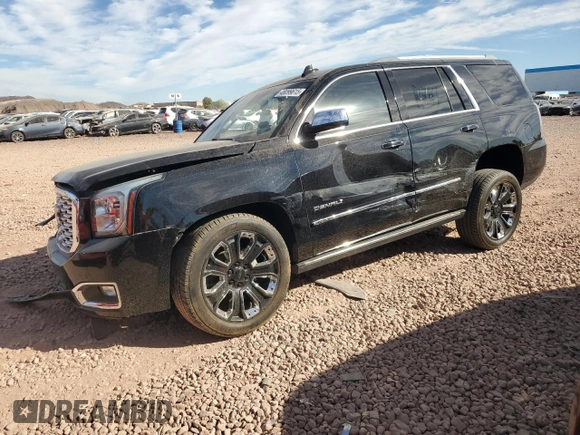 2019 GMC Yukon Denali with VIN 1GKS2CKJ7KR212228, listed as a Copart auction lot 46099615 with 33,844 mi miles and Salvage Title. Bid and sale history available at carsss.com. Image 1.