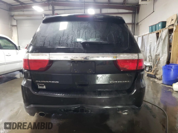 2012 Dodge Durango Citadel with VIN 1C4SDJET7CC183017, listed as a Copart auction lot 83441934 with 183,568 mi miles and Salvage Title. Bid and sale history available at DreamBid. Image 6.