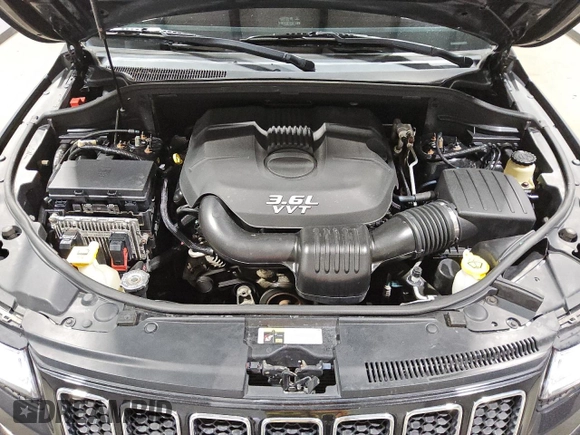 2014 Jeep Grand Cherokee Overland with VIN 1C4RJFCGXEC153250, listed as a Copart auction lot 51327195 with 132,282 mi miles and Clean Title. Bid and sale history available at DreamBid. Image 12.