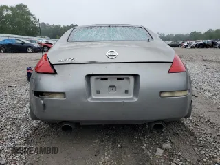 2003 Nissan 350Z Performance z VIN JN1AZ34D33T106988, wystawiony jako Copart lot #57933985 z przebiegiem 203 959 mil mil oraz Szkoda całkowita • Salvage title. Historia ofert i sprzedaży dostępna na DreamBid. Obrazek 6.