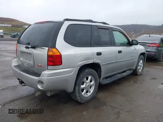 2006 GMC Envoy SLE z VIN 1GKDT13S562187698, wystawiony jako IAAI lot #41808778 z przebiegiem 167 023 mil mil oraz . Historia ofert i sprzedaży dostępna na DreamBid. Obrazek 4.