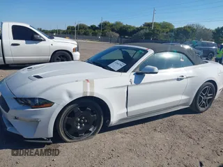 2019 Ford Mustang EcoBoost z VIN 1FATP8UH8K5162526, wystawiony jako IAAI lot #41846704 z przebiegiem 84 527 mil mil oraz . Historia ofert i sprzedaży dostępna na DreamBid. Obrazek 6.