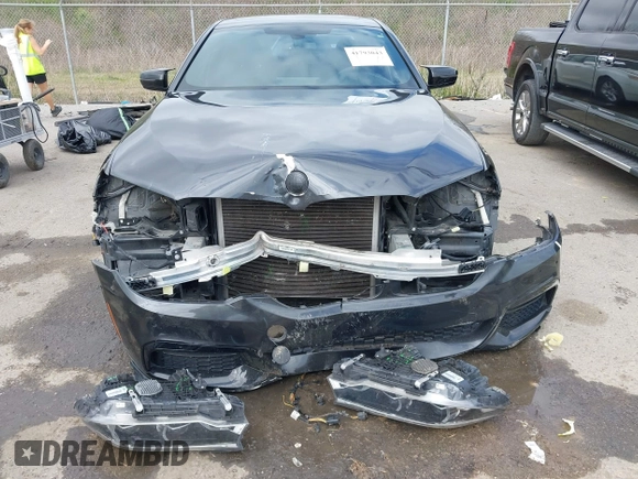 2017 BMW 5 Series 540i with VIN WBAJE5C35HG916844, listed as a IAAI auction lot 41793043 with 92,964 mi miles and . Bid and sale history available at carsss.com. Image 12.