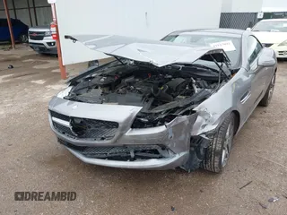 2014 Mercedes-Benz SLK 250 with VIN WDDPK4HA6EF084283, listed as a IAAI auction lot 41927893 with 32,143 mi miles and . Bid and sale history available at DreamBid. Image 6.