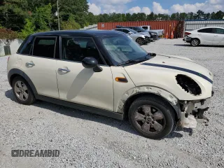 2016 MINI Hardtop 4 Door with VIN WMWXU1C59G2D08847, listed as a Copart auction lot 59763805 with 114,105 mi miles and Salvage title. Bid and sale history available at DreamBid. Image 4.