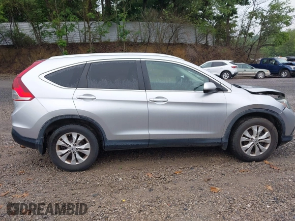 2013 Honda CR-V EX-L with VIN 2HKRM4H73DH618328, listed as a IAAI auction lot 42647497 with 200,667 mi miles and . Bid and sale history available at DreamBid. Image 14.