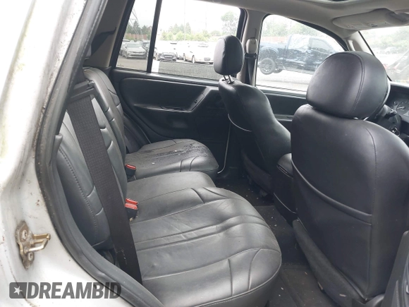 2004 Jeep Grand Cherokee Laredo with VIN 1J4GW48N34C145956, listed as a IAAI auction lot 42201114 with 137,815 mi miles and . Bid and sale history available at DreamBid. Image 7.