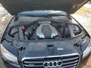 2015 Audi A8 z VIN WAUJGAFD4FN028750, wystawiony jako Copart lot #89099265 z przebiegiem 44 149 mil mil oraz Szkoda całkowita • Salvage title. Historia ofert i sprzedaży dostępna na DreamBid. Obrazek 11.