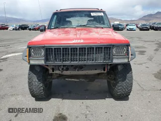 1996 Jeep Cherokee Sport with VIN 1J4FJ68S6TL213886, listed as a Copart auction lot 51462275 with 215,091 mi miles and Salvage title. Bid and sale history available at DreamBid. Image 5.