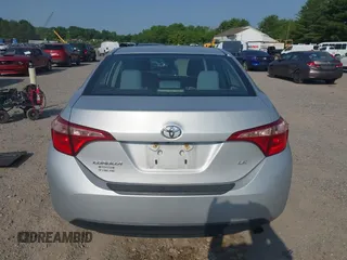 2018 Toyota Corolla L with VIN 2T1BURHE6JC100175, listed as a IAAI auction lot 42405737 with 123,183 mi miles and . Bid and sale history available at DreamBid. Image 16.