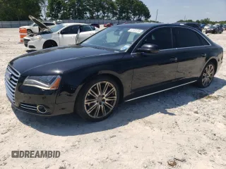 2014 Audi A8 3.0L TDI with VIN WAURMAFDXEN002101, listed as a Copart auction lot 61505774 with 196,482 mi miles and Salvage title. Bid and sale history available at DreamBid. Image 1.