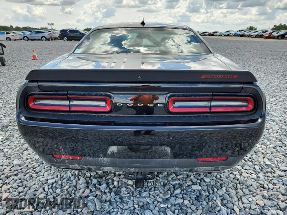 2023 Dodge Challenger R/T Scat Pack Widebody z VIN 2C3CDZFJ3PH596415, wystawiony jako Copart lot #61161035 z przebiegiem 10 317 mil mil oraz Szkoda całkowita • Salvage title. Historia ofert i sprzedaży dostępna na DreamBid. Obrazek 6.